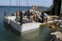 Construction of a wave deflection wall for the coastal protection of the health resort.