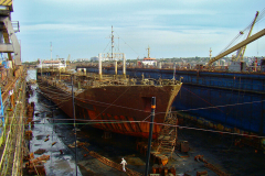 Lifting operation the sunken floating dock No. 154 with the "Volgoneft-263" tanker on the slipway deck.