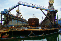Lifting operation the sunken floating dock No. 154 with the "Volgoneft-263" tanker on the slipway deck.
