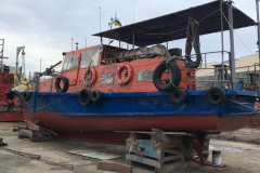 Boats repair on the shore.