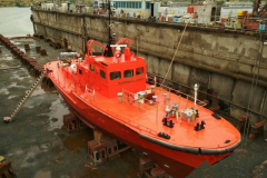 Dockside repair of a pilot boat.